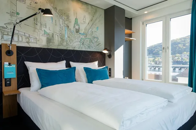 غرفة قياسية بسرير كوين، Motel One Freiburg 3/7