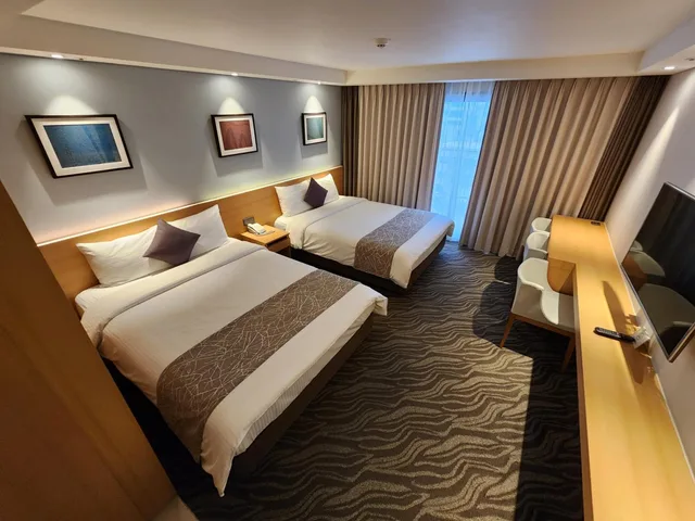 غرفة عائلية بسريرين منفصلين بشرفة، Seogwipo JS Hotel 6/10