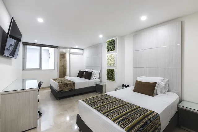 غرفة ثلاثية بسرير مزدوج وسرير فردي، Hotel Madeiro 8/10