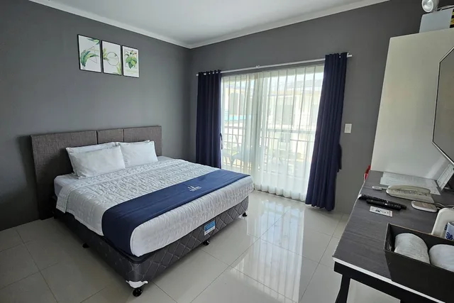 غرفة ديلوكس بسرير كينج، Casa Blu Hotel & Resort by ZUZU 1/2