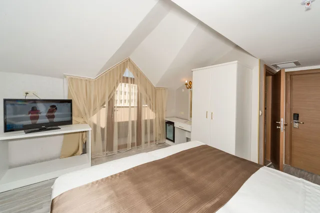 غرفة قياسية بغرفة نوم واحدة مفردة بسرير كوين، Grand Pamir Hotel 3/5