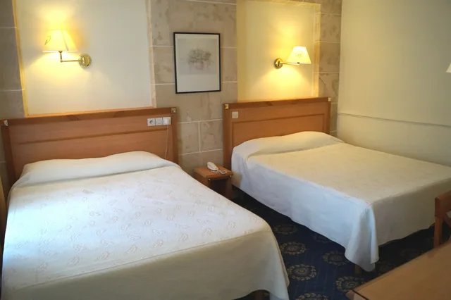 غرفة كومفورت رباعية بسريرين مزدوجين، Hotel Havane Opera 5/10