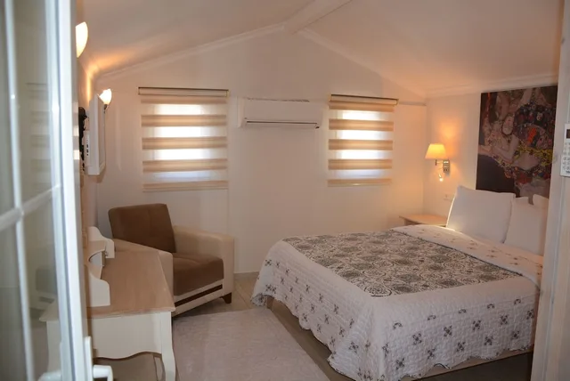 شقة كومفورت بسرير كوين وسريرين منفصلين بإطلالة على البحيرة بغرفتي نوم، Berg Hotel 3/4