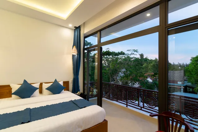 غرفة ديلوكس بسرير مزدوج أو سريرين منفصلين بشرفة، An Bang Scent Beach Homestay 1/10