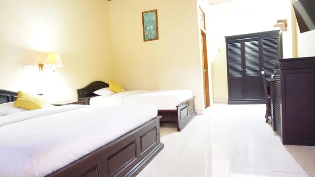 غرفة ثلاثية بسرير مزدوج، Masainn Hotel Kuta 1/2