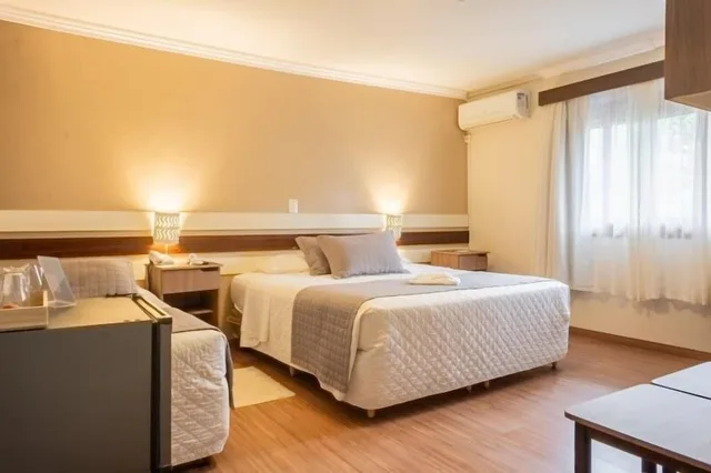 غرفة قياسية بسرير مزدوج وسرير فردي، Hotel Bertoluci 3/10