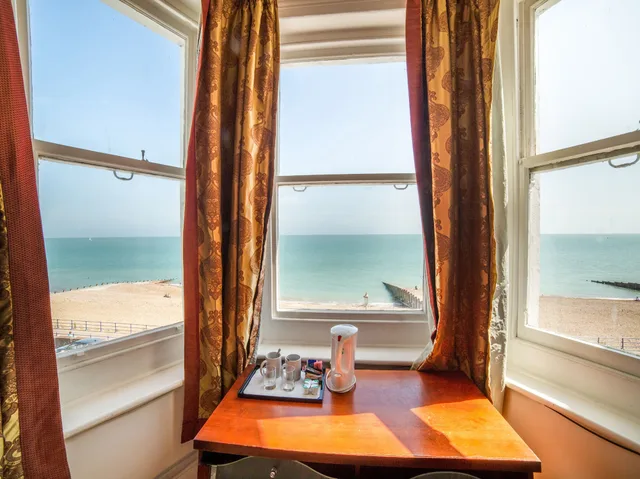 Family, 1 Double and 1 Single Bed, OYO The Strand Hotel 6/6