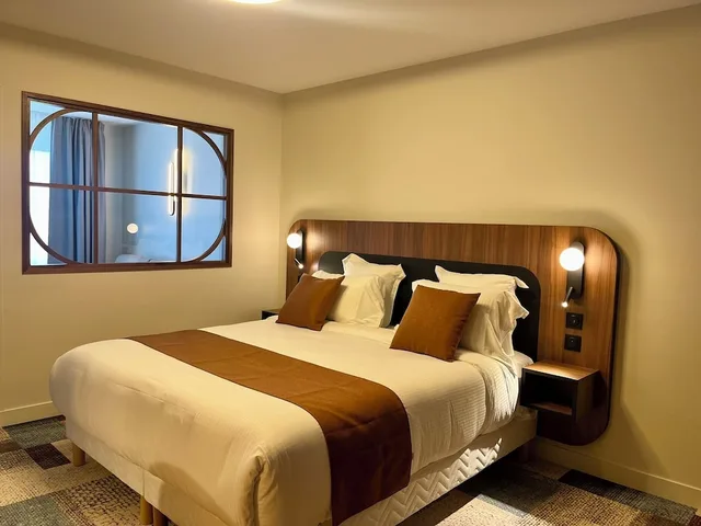 جناح بسرير كوين مع أريكة، Hotel Le Yachtman 1/2