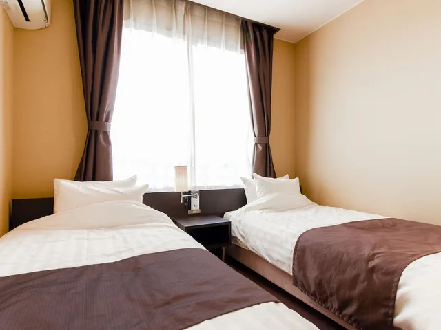 غرفة بسريرين منفصلين، Tanegashima Araki Hotel 1/2