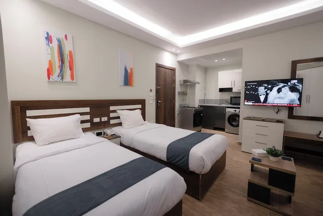 استوديو ديلوكس بسريرين منفصلين مع أريكة، Royal Inn Residence New Cairo 4/9
