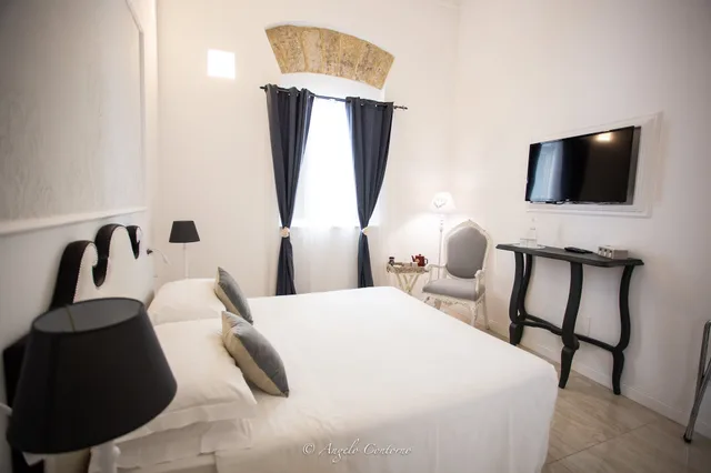 غرفة سوبيريور بسرير كينج، Palazzo Del Poeta 4/7