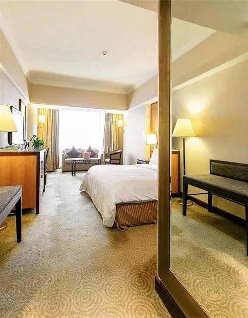 غرفة ديلوكس بسرير كينج، Golden Flower Hotel Xian 1/1