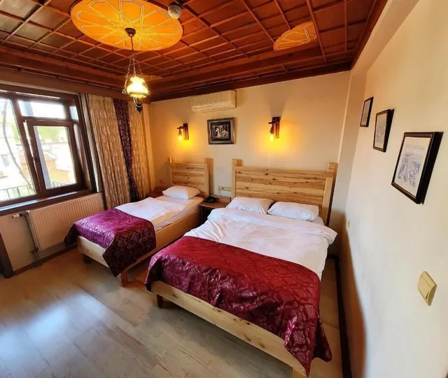 غرفة سوبيريور بسرير مزدوج وسرير فردي بإطلالة على المدينة، Saruhan Hotel 7/10