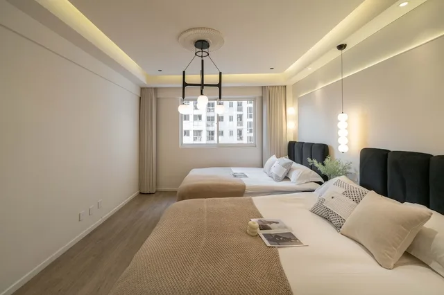 2 Bedrooms, Senior, Apartment, 1 Queen and 2 Double Beds, Bathtub, Book and Bed-People's Square 3/10