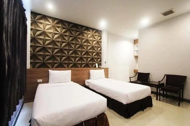 غرفة بسريرين منفصلين، Seree Grand Resort 5/7