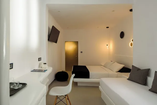 غرفة ديلوكس ثلاثية بسرير مزدوج مع أريكة، Tataki Hotel 7/10