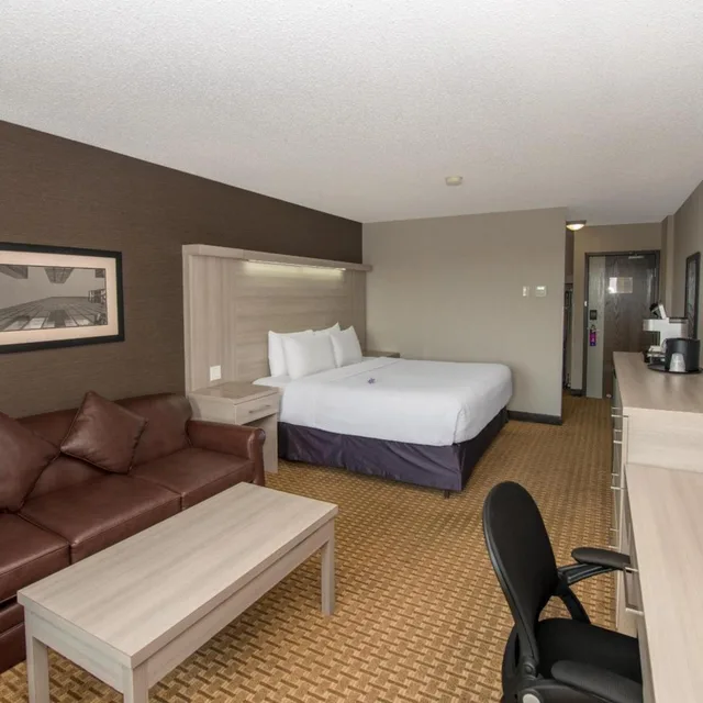 غرفة ديلوكس بسرير كينج، Village Park Inn Calgary 3/5
