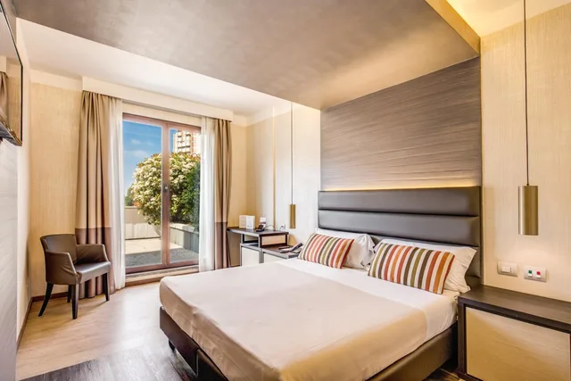 غرفة عائلية رباعية بسريرين منفصلين بشرفة، Warmthotel 1/1