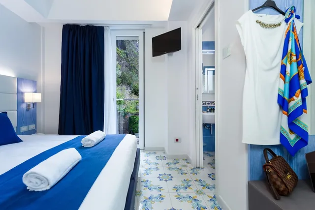 غرفة تقليدية بسرير مزدوج وسرير فردي، Hotel Giosue A Mare 3/4