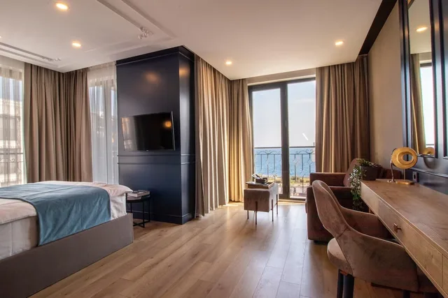 جناح ديلوكس بسرير مزدوج بإطلالة على البحر مع أريكة، Espina Hotel 1/6