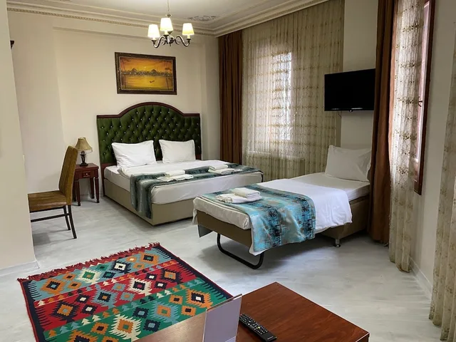 غرفة عائلية بسرير كوين وسريرين فرديين، Atam Suites Apart 4/10