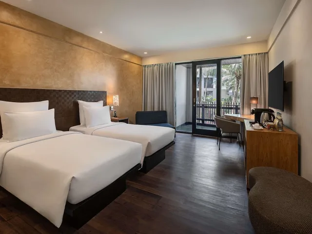 غرفة بريميوم ديلوكس بسرير كينج بإطلالة على الحديقة، Pullman Bali Legian Beach 3/7