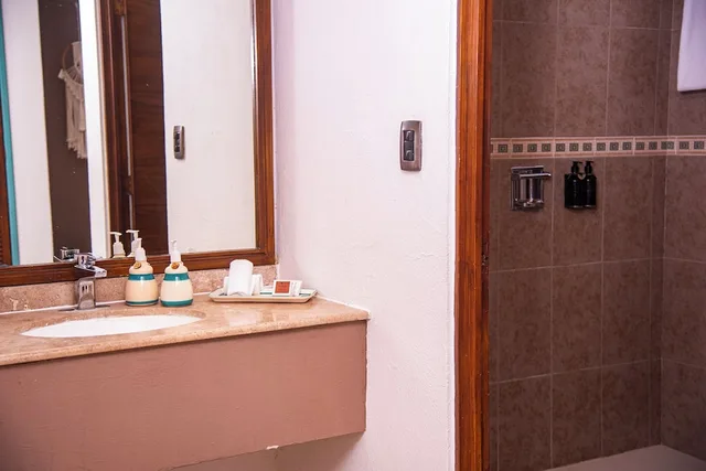 غرفة ديلوكس بسرير كينج بإطلالة على البحر، Hotel B Cozumel 6/7