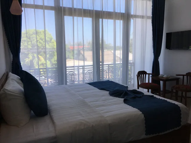 غرفة ديلوكس بسرير مزدوج أو سريرين منفصلين بشرفة، An Bang Scent Beach Homestay 8/10