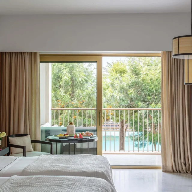 غرفة ديلوكس بسريرين منفصلين بإطلالة على المسبح بشرفة، Victoria Golf Resort and Spa Managed by Accor 3/4