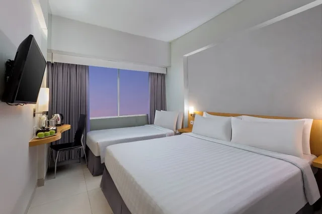 غرفة عائلية بسرير مزدوج وسرير فردي، favehotel Manahan - Solo 2/8