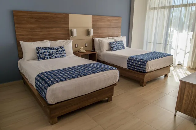 غرفة بسريرين مزدوجين بإطلالة على البحر، Ocean View Beach Hotel 3/5