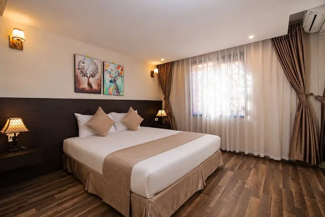 جناح عائلي بسرير كينج وسرير كوين بغرفتي نوم مع أريكة، Lacasa Sapa Hotel (Ex. Hoang Ha Sapa Hotel) 6/10