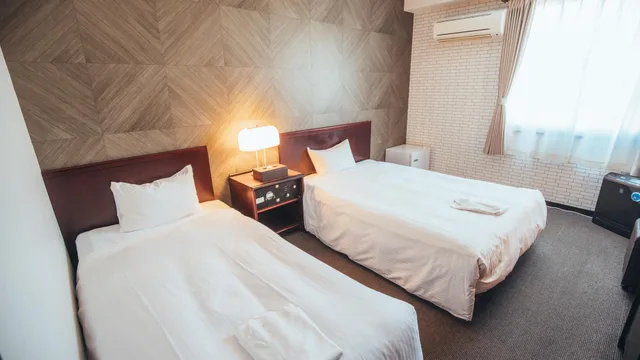 غرفة مفردة بسريرين منفصلين في الملحق، Hotel AreaOne Miyazaki 1/1