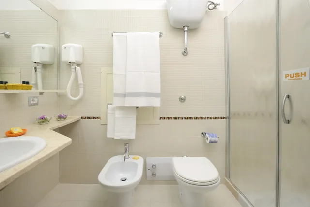 غرفة رباعية بسرير مزدوج وسرير بطابقين، Hotel Oasis Alghero 4/5