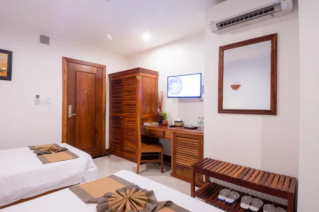 غرفة ديلوكس ثلاثية بثلاثة أسرّة بإطلالة على المدينة بحوض استحمام، RELAX HOTEL 3/4