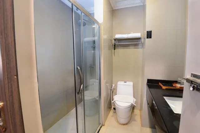 غرفة ديلوكس بسريرين منفصلين، The Rich Jogja Hotel 2/2