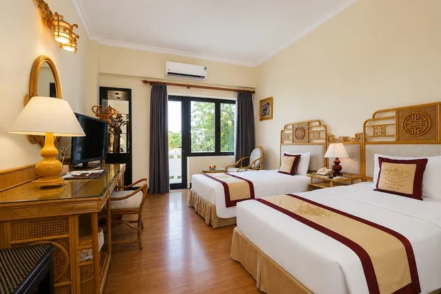 غرفة ديلوكس بسريرين منفصلين بإطلالة على الحديقة، Huong Giang Hotel 6/10