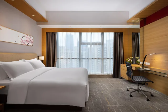 غرفة بريميير بسرير كينج وسرير كوين، New World Wuhan Hotel 1/2