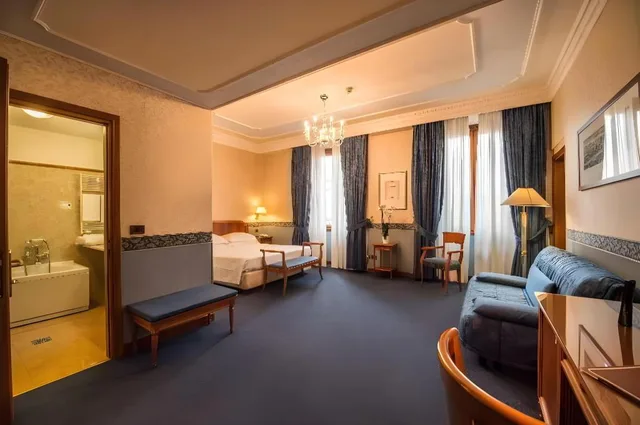 غرفة قياسية ثلاثية بسرير كوين وسرير فردي، Strozzi Palace Hotel 5/10