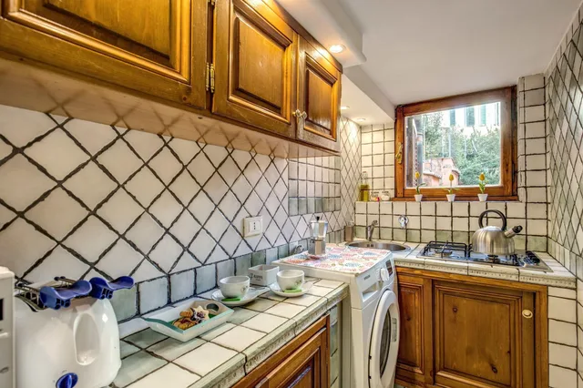 شقة بسرير مزدوج وسرير فردي بشرفة بغرفة نوم واحدة مع أريكة، Tritone Top House 7/10