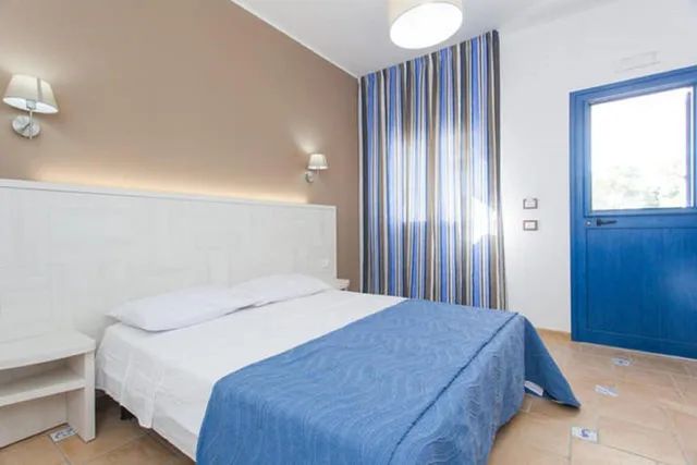 غرفة قياسية بسرير مزدوج أو سريرين منفصلين، Residence Villaggio Petruso 1/2