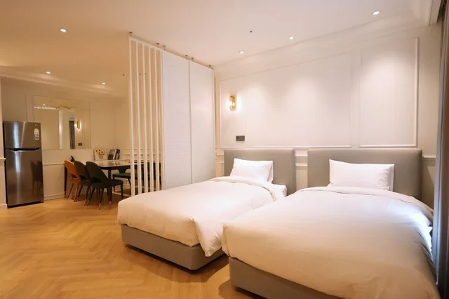 جناح ملكي بسريرين كينج وثلاثة أسرّة، Busan City Hotel 2/10