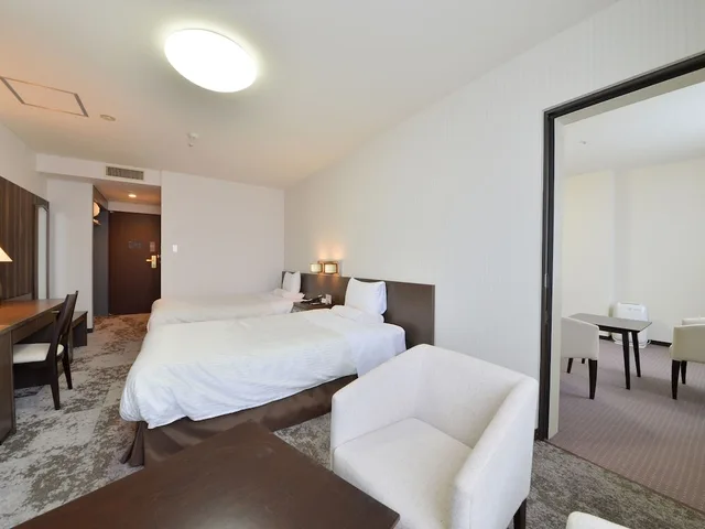 غرفة متصلة قياسية بأربعة أسرّة وسريرين منفصلين للمدخنين، Hakodate Kokusai Hotel 1/3