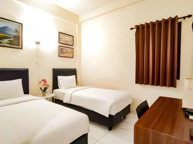غرفة سوبيريور بسرير كوين وسريرين منفصلين، Grace Setia Hotel 1/1