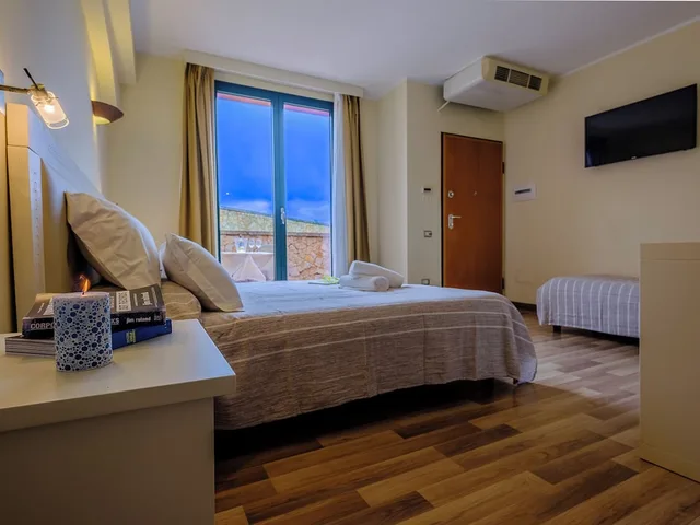غرفة قياسية ثلاثية بسرير مزدوج وسرير فردي، Villa Barbarina Nature Resort 9/10