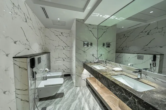 غرفة ديلوكس بسرير كينج، Movenpick Hotel Centaurus 8/9