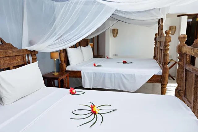 غرفة ديلوكس عائلية بإطلالة على البحر، Tanzanite Beach Resort 2/4