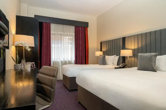 غرفة كلاسيكية ثلاثية بسرير كوين وسرير فردي، The Trinity City Hotel 1/4