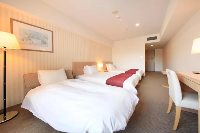 غرفة ديلوكس بسريرين منفصلين مع سرير إضافي للمدخنين، Quintessa Hotel Sasebo 1/3