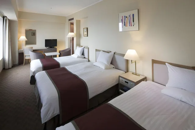 غرفة سوبيريور بسريرين مزدوجين مع سرير إضافي للمدخنين، Yokkaichi Miyako Hotel 1/1